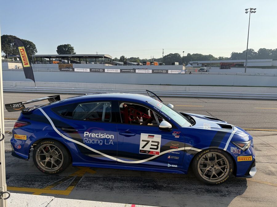 Blue TCR car in pit lane